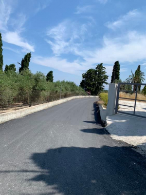 Ολοκληρώθηκε η ανακατασκευή τοιχίου και η επισκευή οδοστρώματος, λόγω κατολίσθησης, στην περιοχή Παραδείσι. ΦΩΤΟ